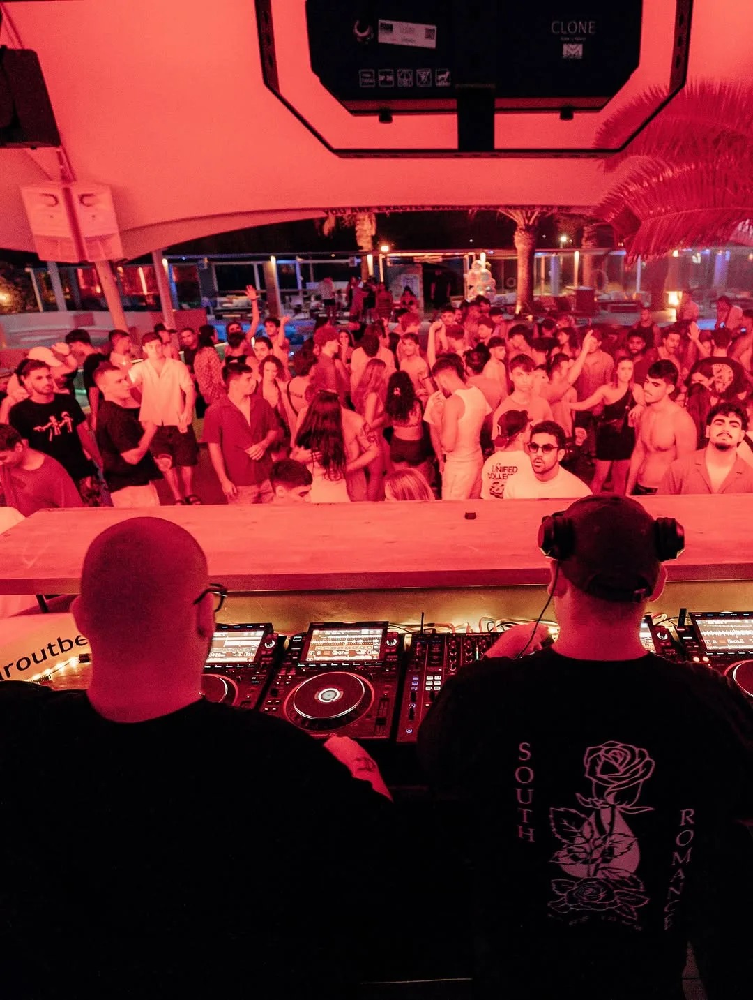 The view from the booth across a packed club floor